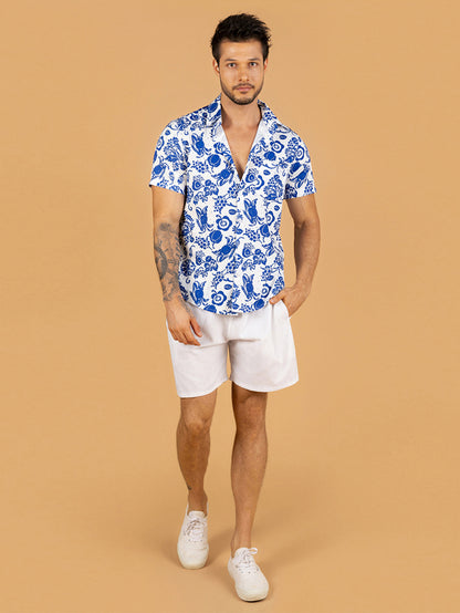 Camiseta estampada com caranguejo azul e algas